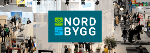 Mässgolv med montrar och människor 