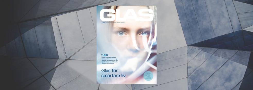 Omslaget till tidningen GLAS centrerad där en pojke tittar igenom ett glas mot kameran